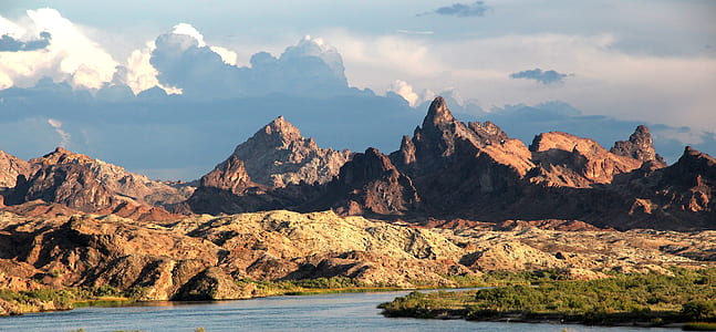 landscape photography of brown mountains thumbnail