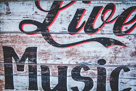 white, black, and red wooden signage with Live Music text thumbnail