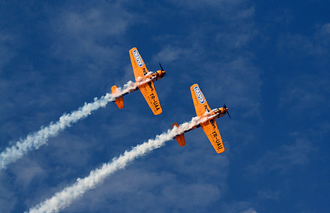 two orange monoplanes on air thumbnail