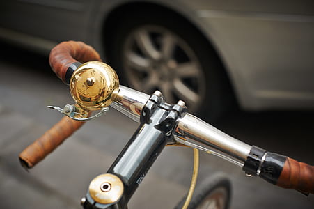 gray and brown road bike outdoors thumbnail