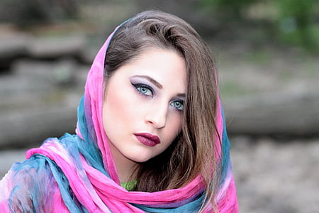 woman wearing pink and blue hijab headdress thumbnail