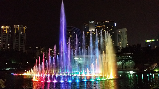 water fountain during nighttime thumbnail