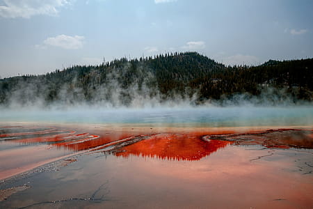 Body of Water Near Mountain thumbnail