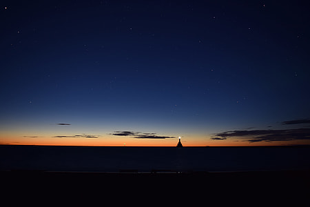 silhouette photo of pyramid during golden hour thumbnail