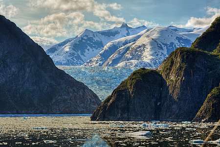 landscape photo of mountain covered by snow during daytime thumbnail