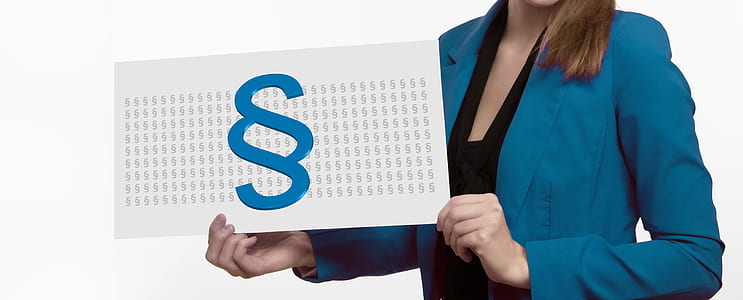 person holding paper thumbnail