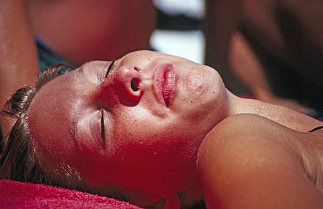 close-up photo of woman's face with closed eyes thumbnail