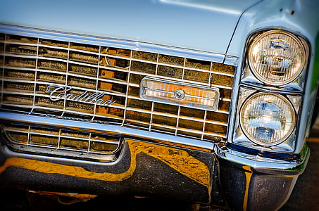 closeup photo of teal Cadillac vehicle thumbnail