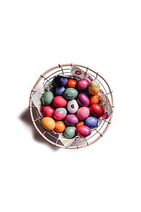 wire basket of painted eggs thumbnail