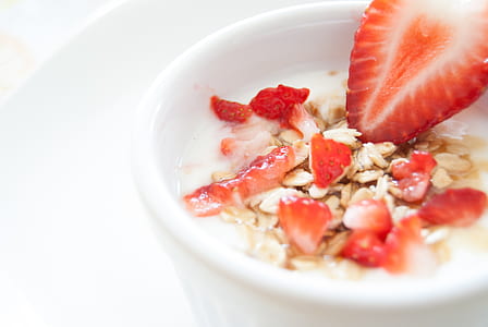 strawberries on white ceramic bowl thumbnail
