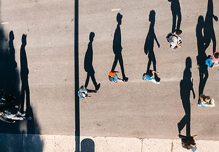 people walking on concrete road thumbnail
