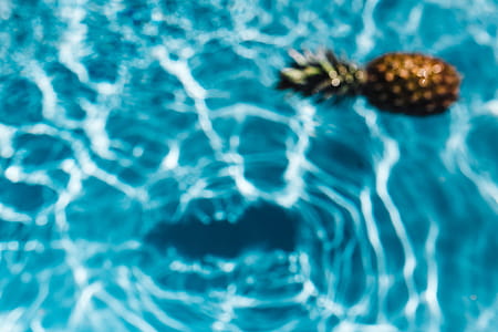 Pineapple in a swimming pool thumbnail