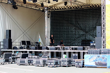 people setting up stage thumbnail