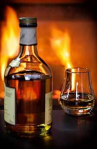 closeup photo of clear glass liquor bottle thumbnail