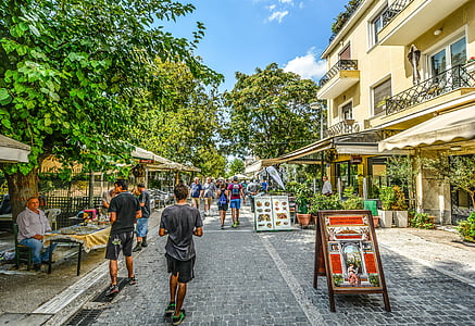 people on asphalt road during daytime painting thumbnail