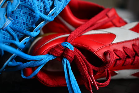 red-and-white lace-up athletic shoes thumbnail