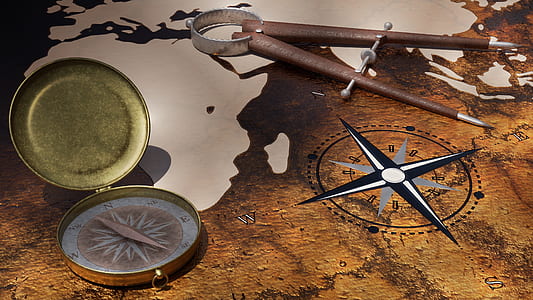 navigational tool on brown surface thumbnail