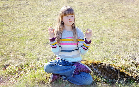 girl doing yoga post during daytime thumbnail
