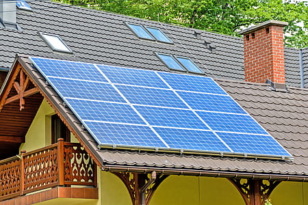 blue and white solar panel on gray roof thumbnail