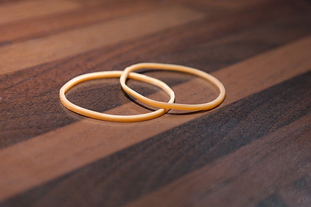 two brown rubber bands thumbnail
