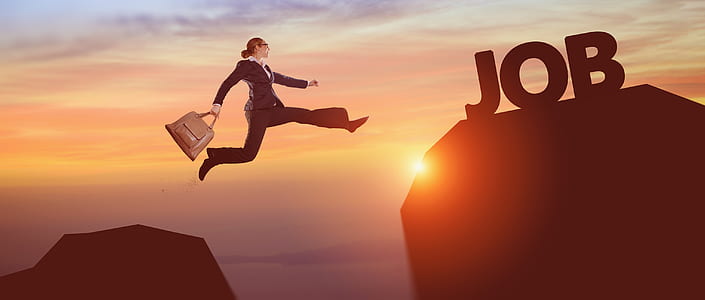 woman holding bag jumping thumbnail