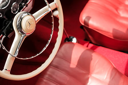 close-up photography of classic white Mercedes-Benz vehicle steering wheel thumbnail