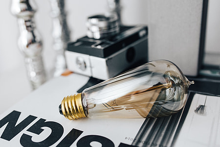 Pencils, magazines and an old lightbulb thumbnail