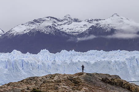 man standing on top of mountain thumbnail