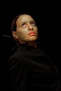 woman wears black collared top thumbnail