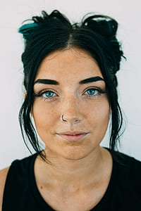 woman in black sleeveless top thumbnail