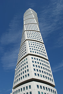 low-angle photo of white concrete building thumbnail