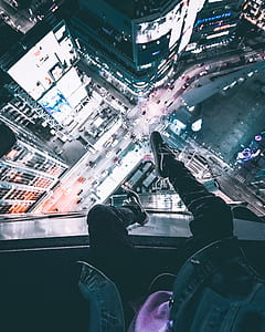 person sitting on rooftop thumbnail