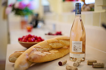 baked breads beside clear labeled glass bottle thumbnail