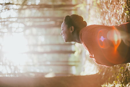 woman head up near trees thumbnail