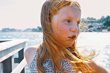girl wearing white and black halter-strap top thumbnail