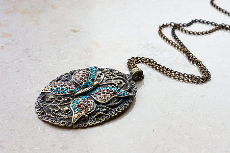 oval gold-colored blue butterfly pendant necklace thumbnail