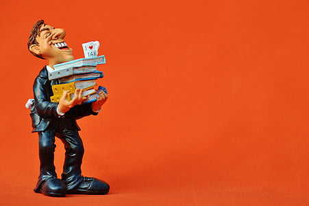 profile of man carrying books figurine thumbnail