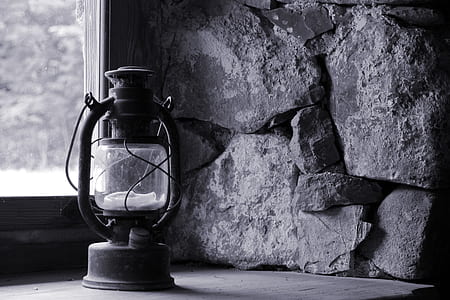 turned-off lamp on desk near window in grayscale photography thumbnail