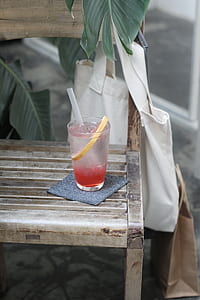 clear drinking glass on top of table thumbnail