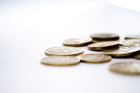person showing bronze coins thumbnail