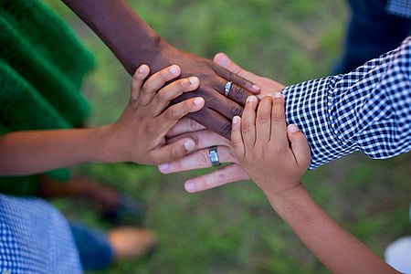 photo of four person with stocking hands thumbnail