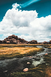landscape photography of green and brown field thumbnail