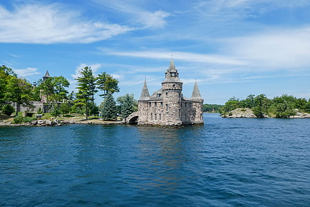 gray castle in body of water thumbnail