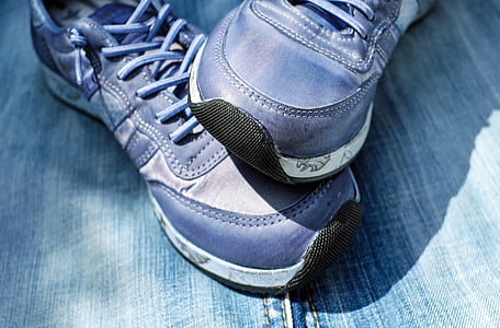 close-up photography of blue running shoes thumbnail