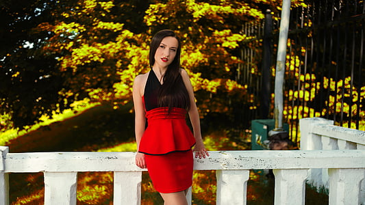 women's standing in front of stairs thumbnail