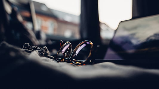selective focus photography of tortoiseshell sunglasses thumbnail