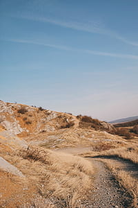 road, sky, sand, grass thumbnail