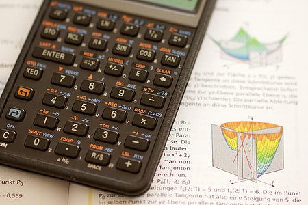 black calculator on textbook thumbnail