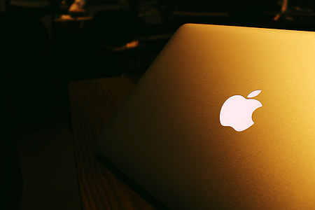 Macbook Pro at night with apple logo thumbnail