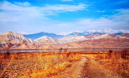 landscape photo of mountains under blue sky thumbnail